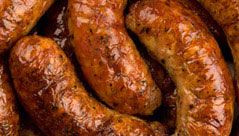 Butchers free range pork sausagespork from local farms    Hand made bangers with roasted onionsand a choice of BBQ sauces ...mmm!